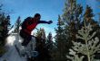 Vrije stijl sneeuwschoentrails Boulder springen