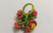 DIY eenvoudige Rainbow loom bloem charme (Made met een Pen)
