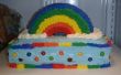 Regenboog cupcakes en taart