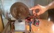 Eenvoudige elektromagnetische motor met behulp van zuiger en vliegwiel