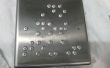 Braille Push Pad "raak niet" The Paradox