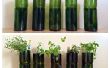 Upcycled wijn flessen in overdekte kruid plantenbakken