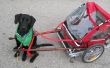 DIY hond pull kar gemaakt van een opvouwbare fiets aanhangwagen. 