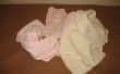 Handdoeken vouwen in kwartalen en derde