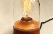 Edison lamp in een glazen stolp