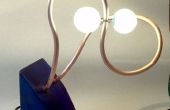 Ping Pong lamp uit teruggewonnen hout en koper buis zonder draden