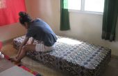 Hoe maak je een bed met gerecycled paint blikjes