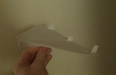 Hoe maak je de beer papieren vliegtuigje