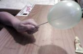 Hoe krijg ik een naald door een ballon
