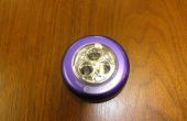 Een verlichte knop uit een puck Ledlamp