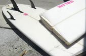 Een zeer gebroken surfplank bevestigen