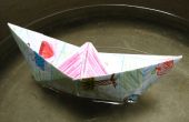 Drijvend boot met origami