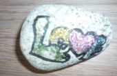 Versier steen met 'Love'