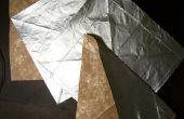 Het verkrijgen van origami papier uit Tetrapack bakstenen