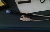 Hoe maak je een 9-pins mannelijke USB-naar-dual USB-kabel