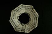 $8 vliegende schijf (dollar bill origami)