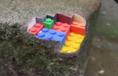 Een blok van de zandsteen gebouwd van lego, mengen van echte objecten met 3D-prints