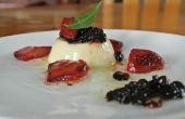 Balsamico parels (moleculaire gastronomie) op olijfolie panna cotta met gekarameliseerde aardbeien